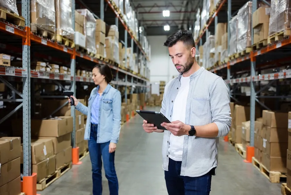Warehouse supervisors planning a phased WarePulse implementation